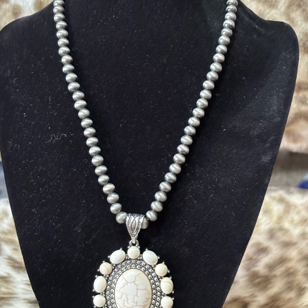 White faux turquoise and silver tone jewelry set.
NWOT. - Picture 2 of 9